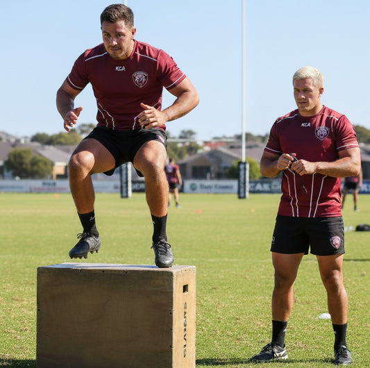 Two rugby players in maroon jerseys 988-custom teamwear